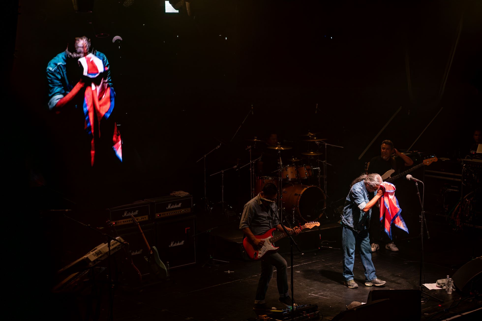 04-Nepathya-frontman-Amrit-Gurung-bow-to-the-national-flag-in-Boston.-Photo---Monsoon-Shrestha---nepalaya-1749827271.jpg